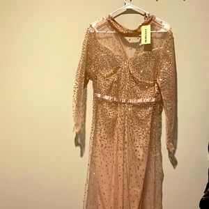 New dress from Fancyqube size L or size 12. Nude/brown with in er lining.